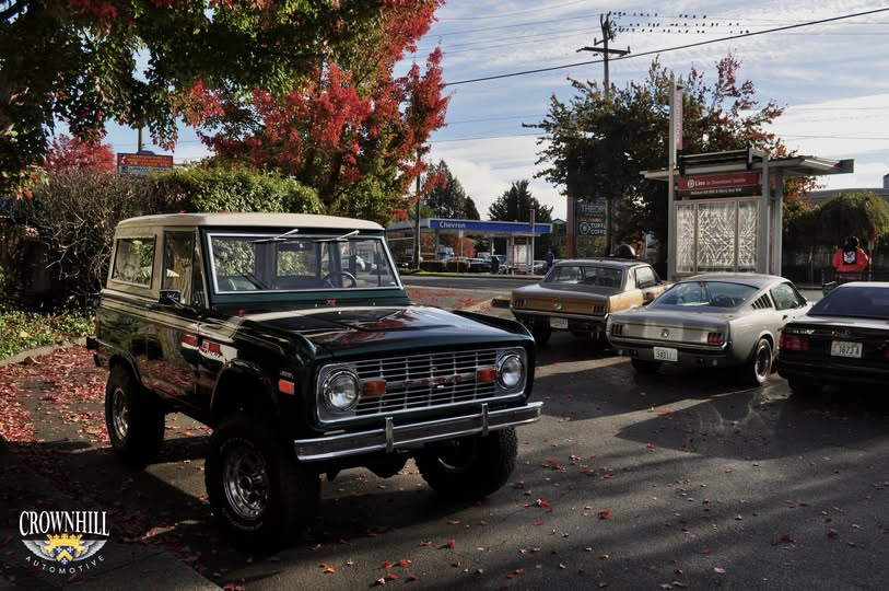 Classic cars parked outside Crown Hill Automotive on Holman Road, Crown Hill, Seattle